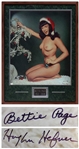 Hugh Hefner and Bettie Page Signed Limited Edition of Pages Famous Christmas Photo -- With JSA COA